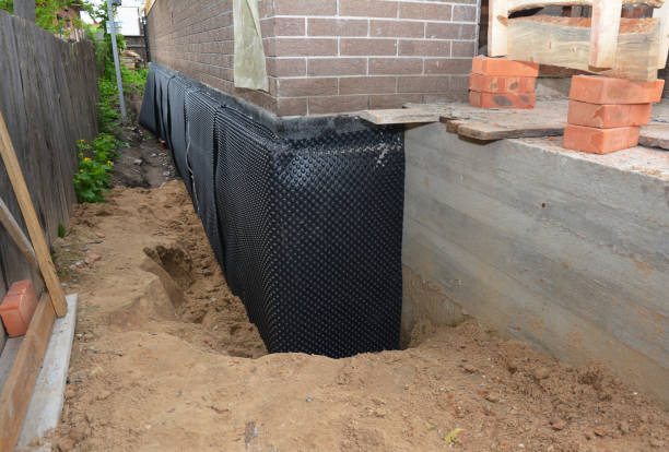 Happy homeowners after waterproofing job in Addyston